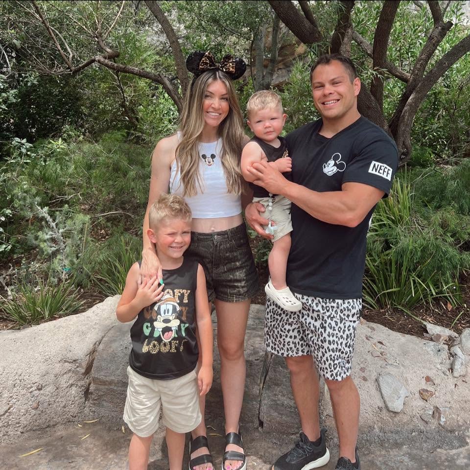Brayden with his partner and two young sons